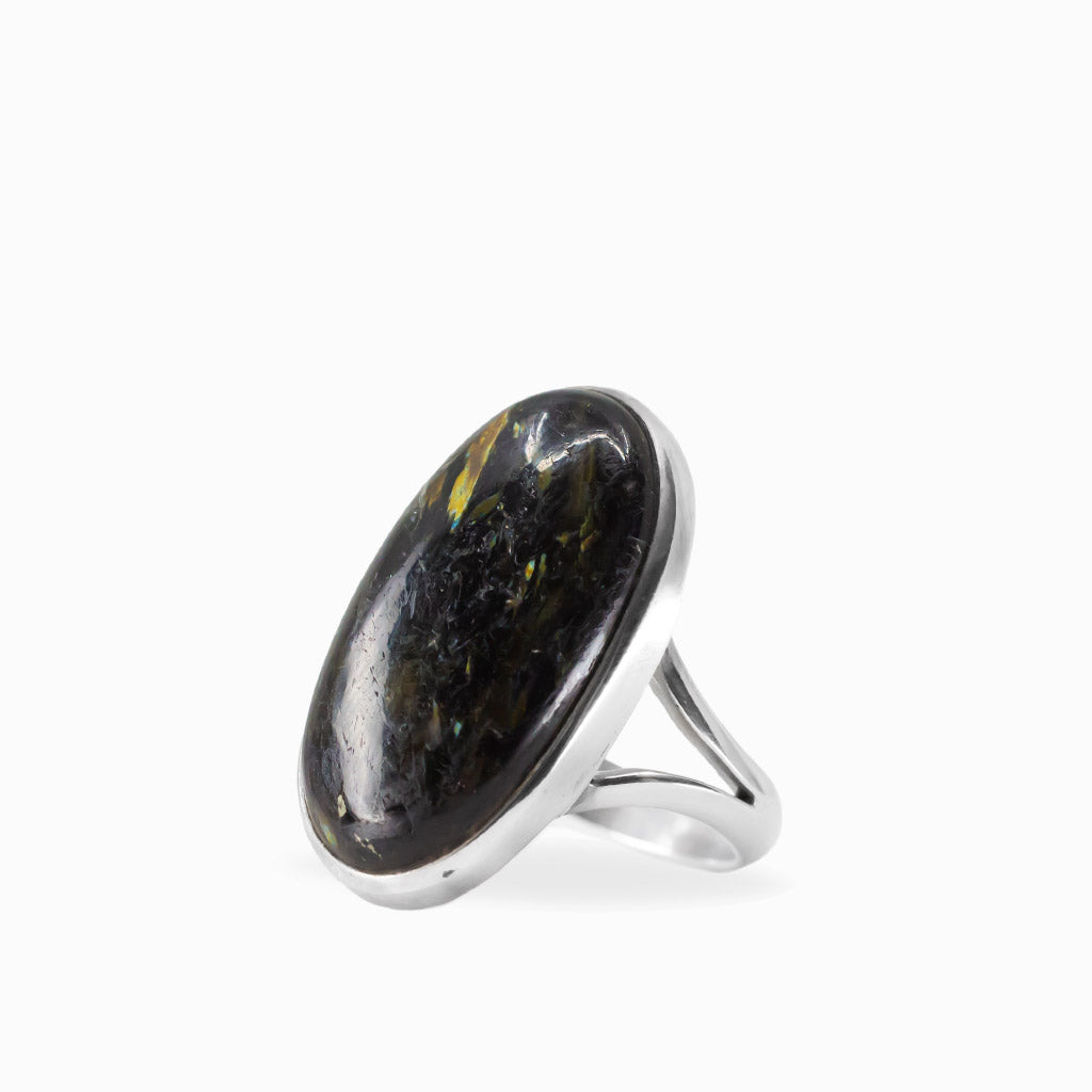 Elongated oval Nuummite cabochon ring with dark tones and subtle golden flashes in polished 925 sterling silver.