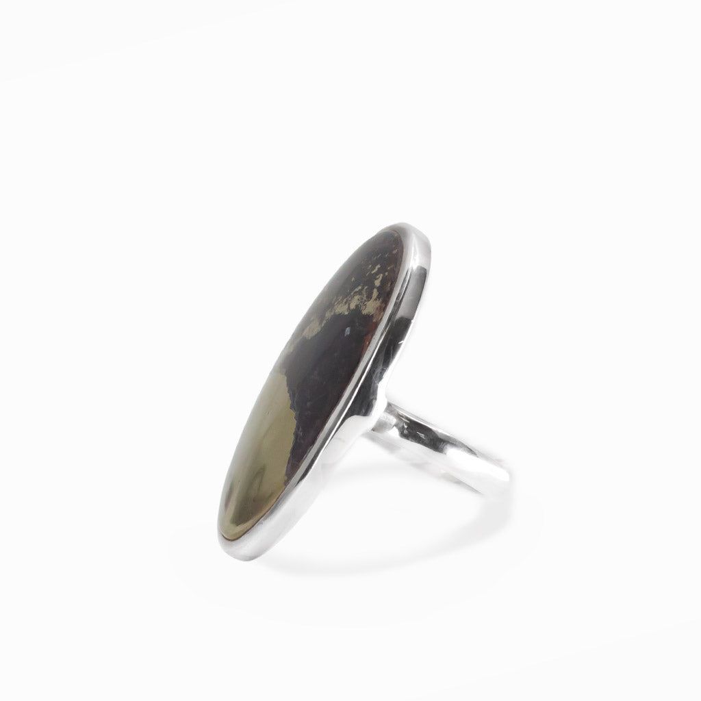Apache Gold oval cabochon ring in polished sterling silver featuring contrasting black and naturally metallic golden mineral tones.
