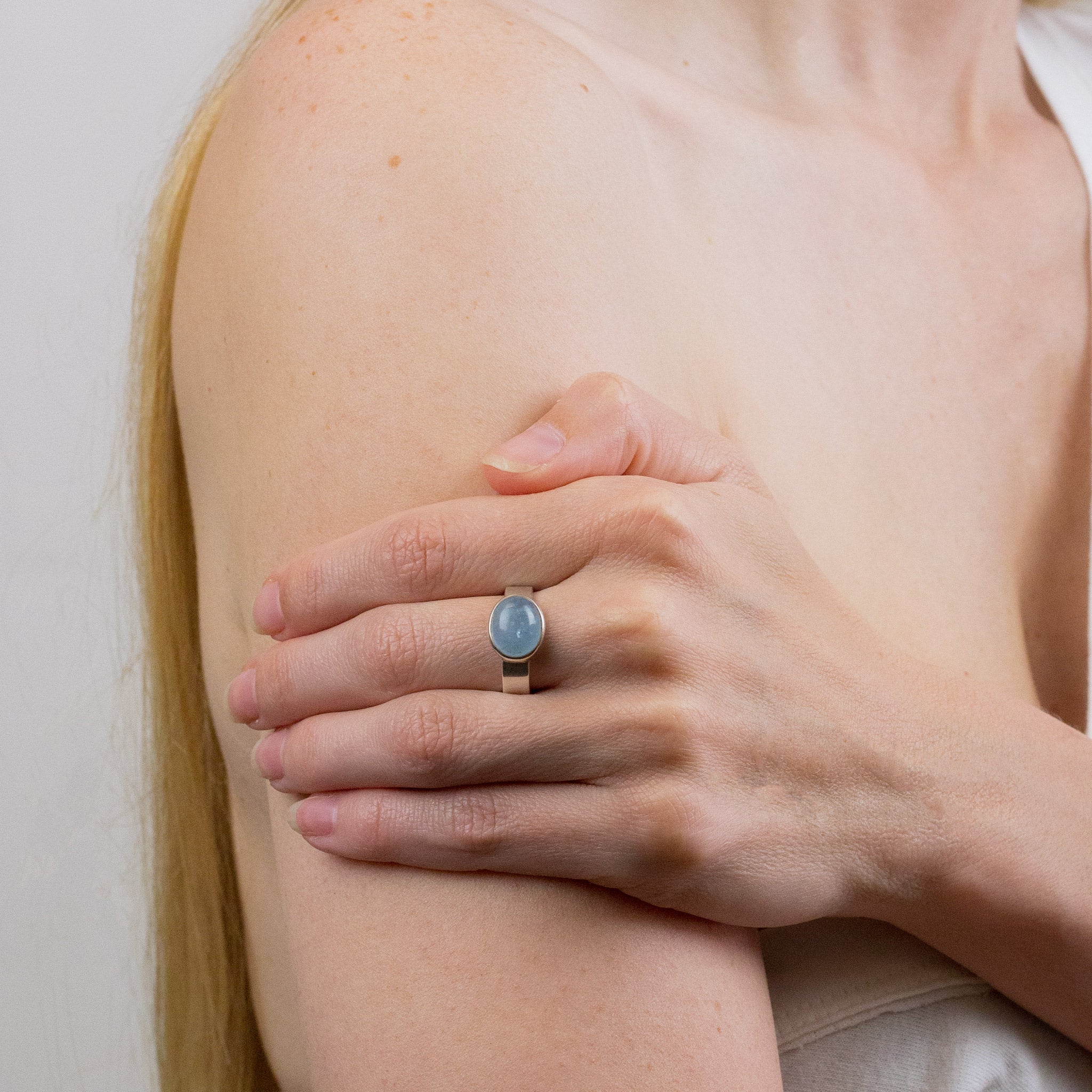 AQUAMARINE RING ON MODEL