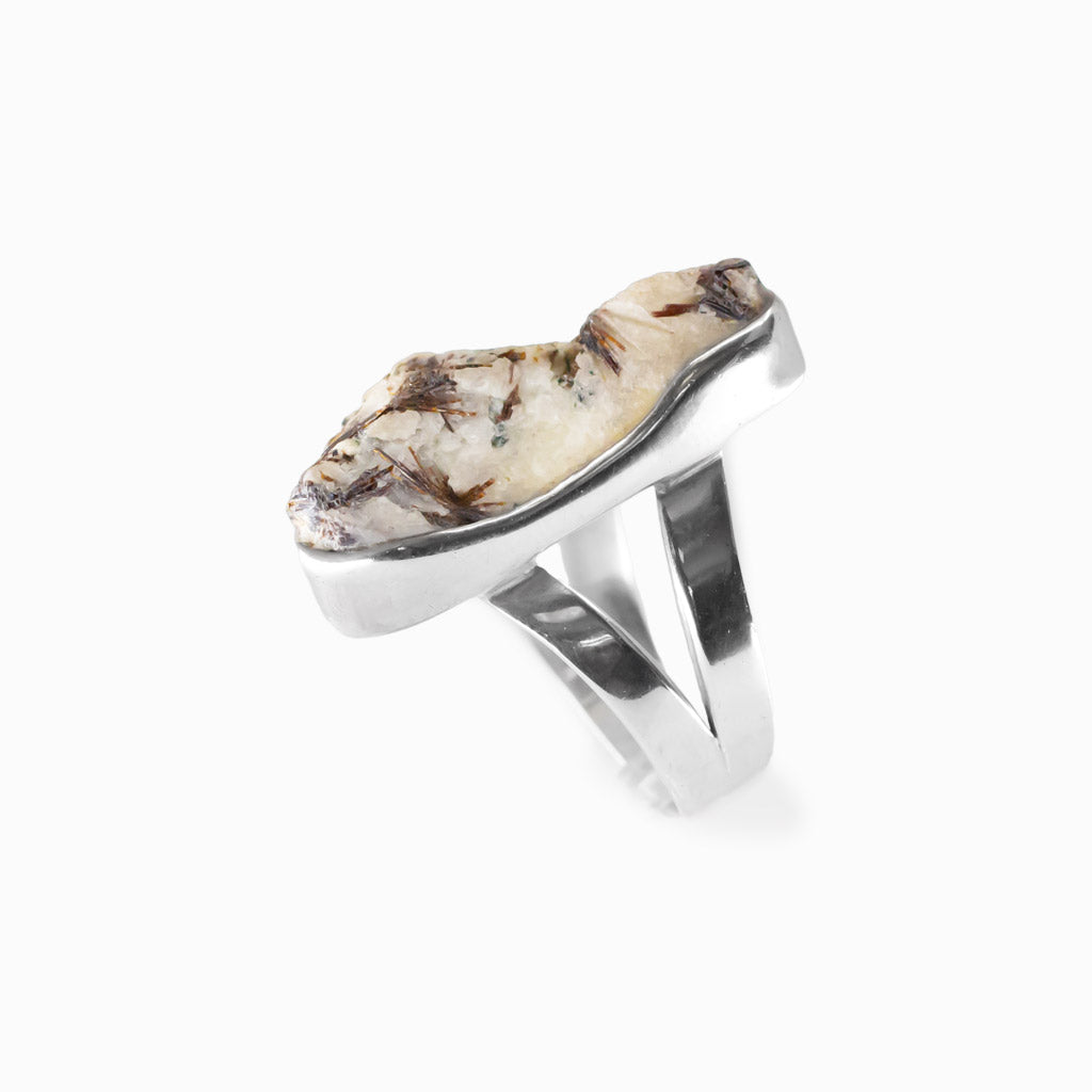 Freeform Astrophyllite gemstone ring with natural bronze inclusions in sterling silver.