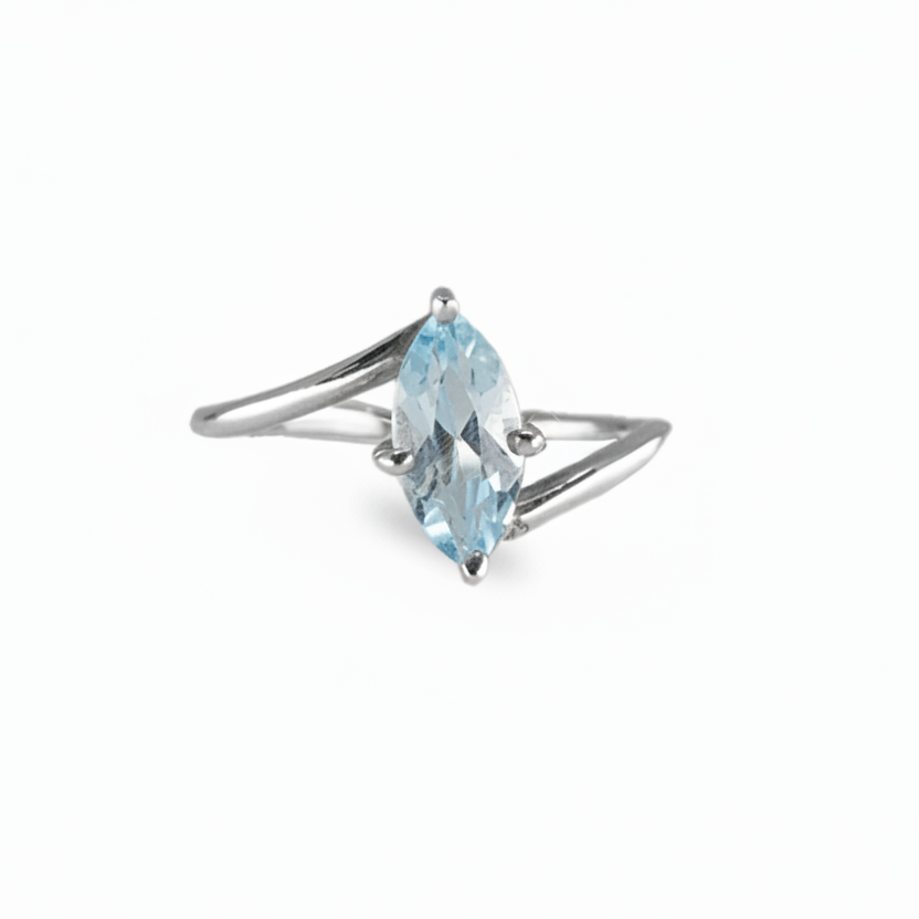 Marquise blue topaz ring with icy faceted gemstone set in sterling silver