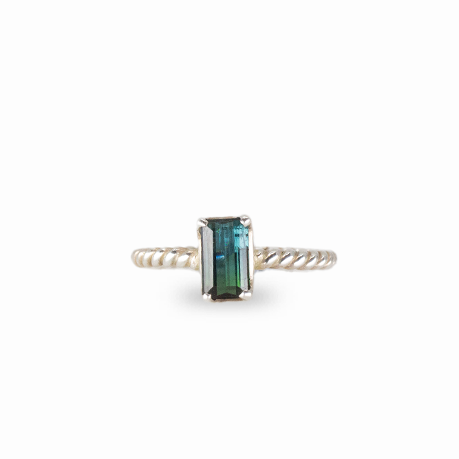 Faceted rectangle blue tourmaline ring set in sterling silver with emerald-cut gemstone