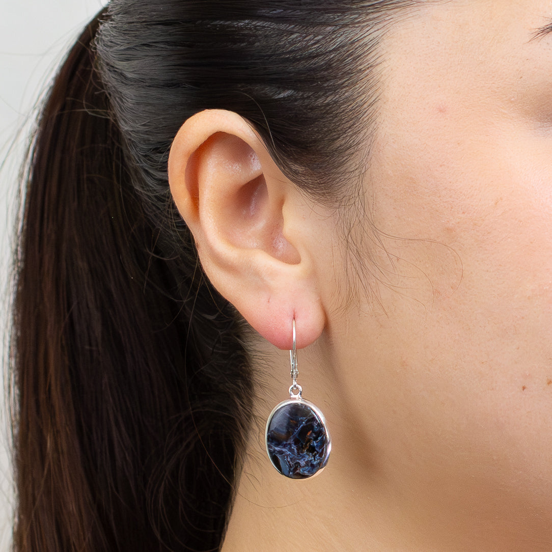 Oval pietersite cabochon earrings with swirling navy, charcoal, and bronze tones set in sterling silver. | MADE IN EARTH