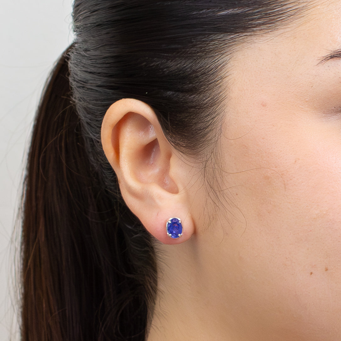 FACETED OVAL TANZANITE CLAW STUD EARRINGS