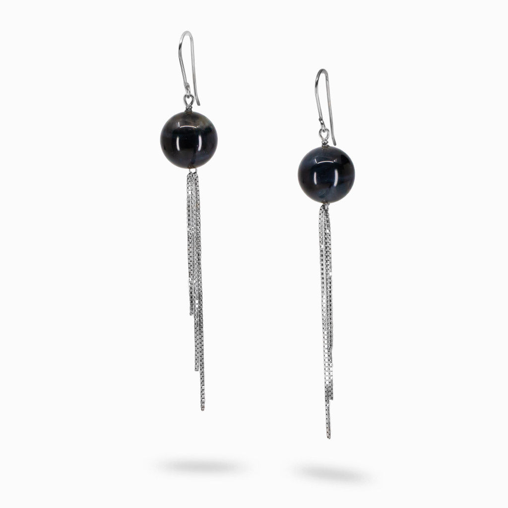 Hawk’s Eye round gemstone earrings with sterling silver multi-chain fringe, photographed on a white background. | MADE IN EARTH