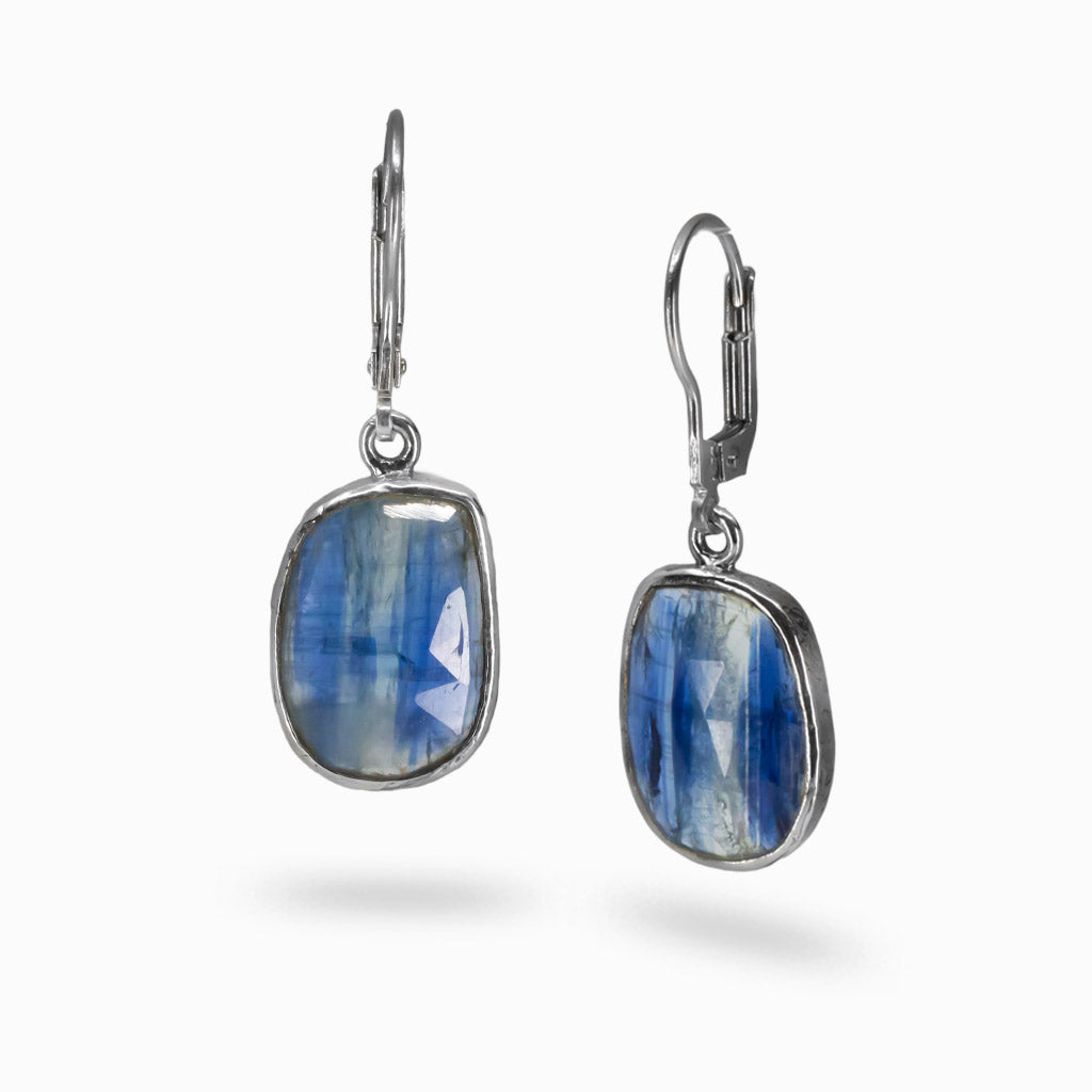 Faceted Kyanite drop earrings in sterling silver with layered blue gemstone patterns. | MADE IN EARTH