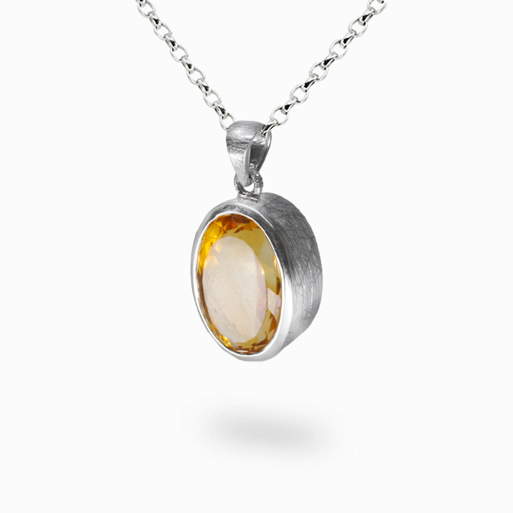 Faceted oval citrine necklace with golden yellow gemstone set in sterling silver. | MADE IN EARTH