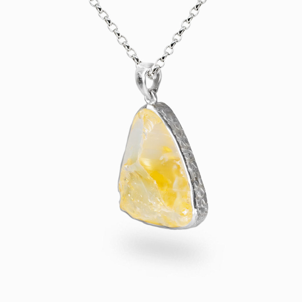 Raw citrine crystal pendant necklace set in a sterling silver bezel. | MADE IN EARTH