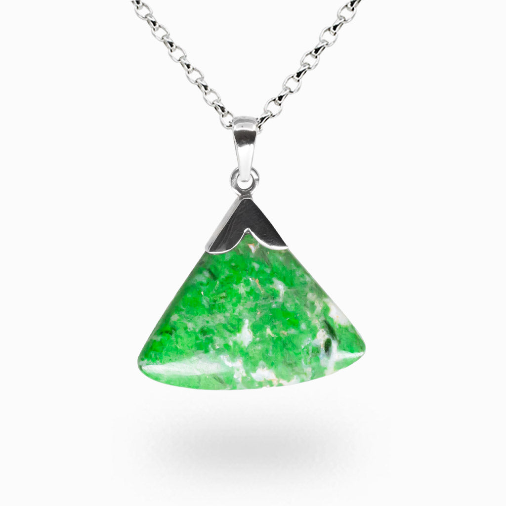 Triangular Maw Sit Sit jade pendant with vivid grassy green marbling set in sterling silver cap on silver chain. | MADE IN EARTH