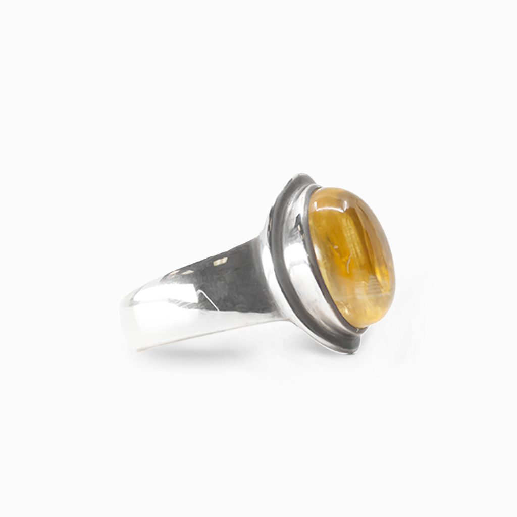 Oval golden-yellow Citrine cabochon ring set in polished 925 sterling silver.