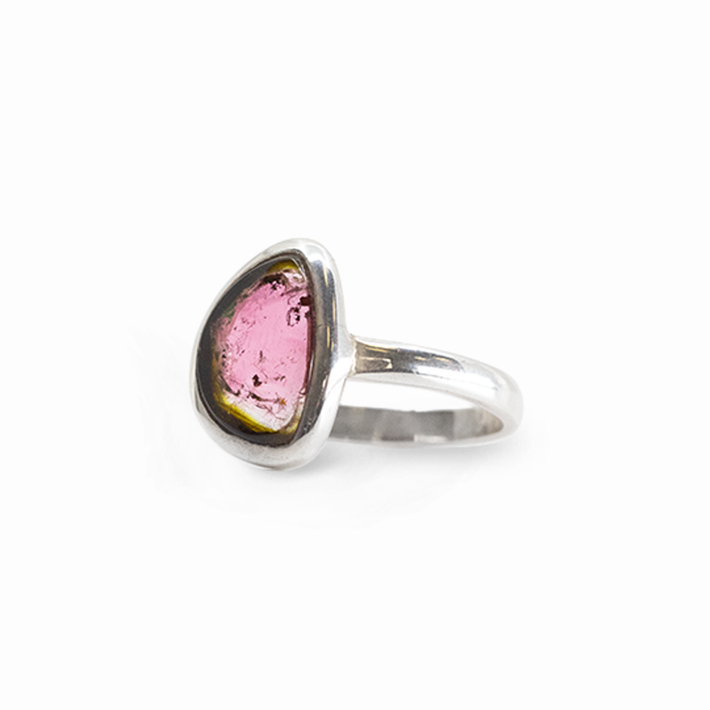 Asymmetrical Watermelon Tourmaline cabochon ring featuring pink and green hues in a polished 925 sterling silver bezel setting with a slender band.