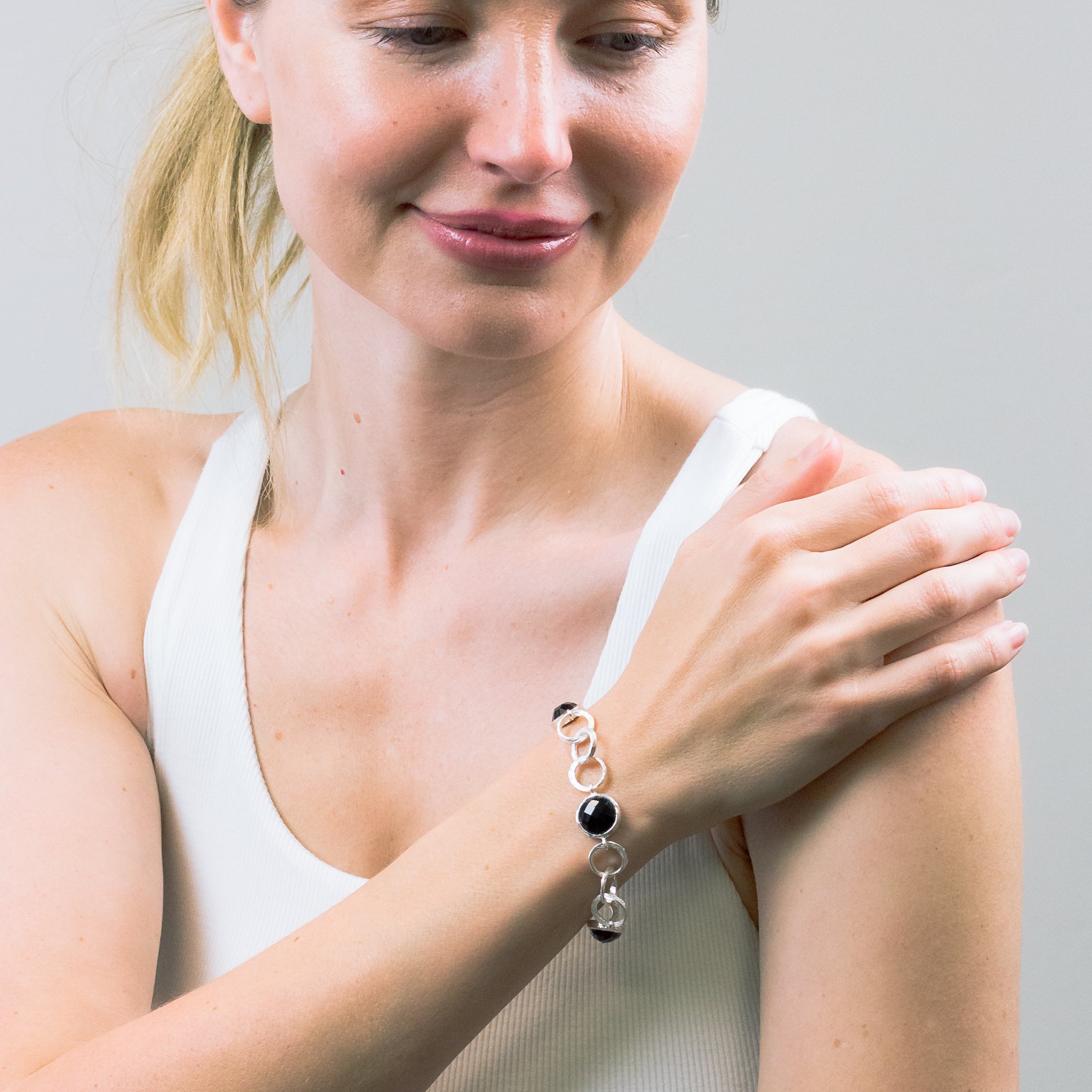 FACETED ONYX BRACELET ON MODEL