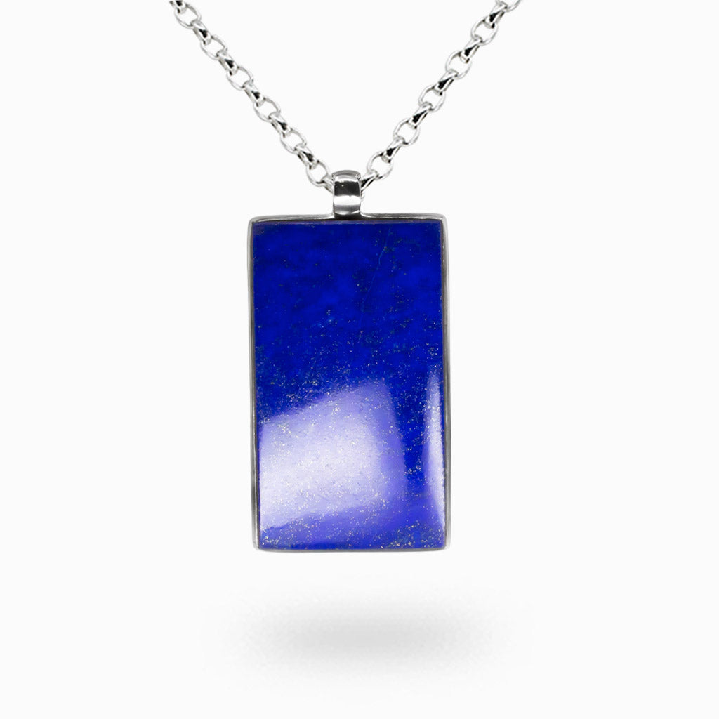 Rectangular lapis lazuli necklace with deep blue stone and gold pyrite specks set in a sterling silver bezel