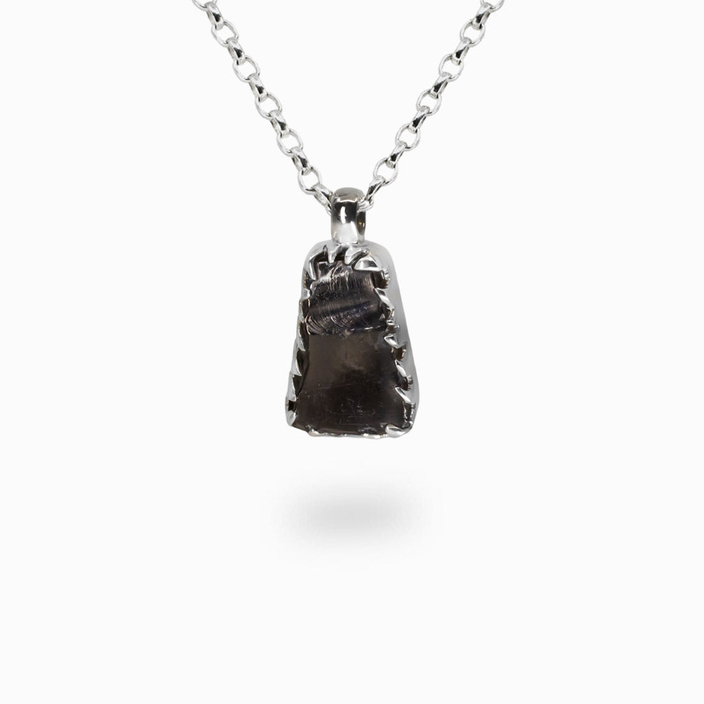 Bell-shaped Shungite necklace in sterling silver. A grounding, protective crystal with sleek modern style.