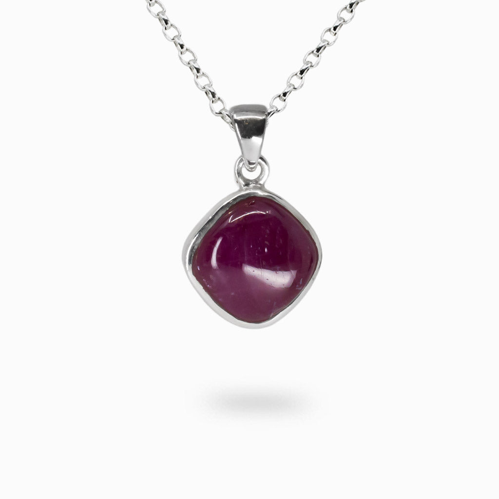 Diamond-shaped red Ruby cabochon necklace set in sterling silver bezel. MADE IN EARTH