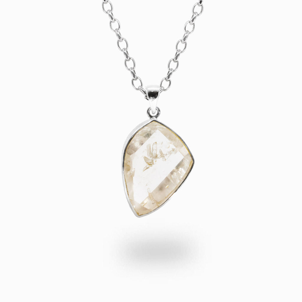 Natural Manifestation Quartz pendant necklace in sterling silver featuring clear quartz with unique internal crystal formations.