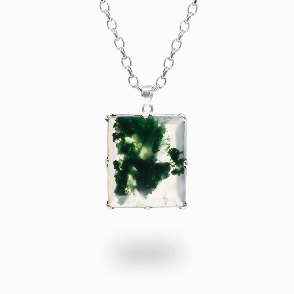 Faceted rectangular Moss Agate pendant necklace in sterling silver with natural green botanical-like inclusions.