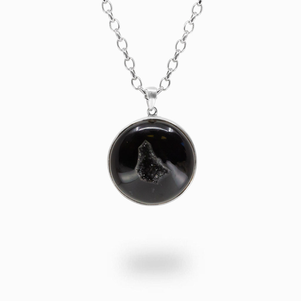 Round Onyx Druzy pendant necklace in sterling silver featuring a sparkling natural druzy crystal cavity.