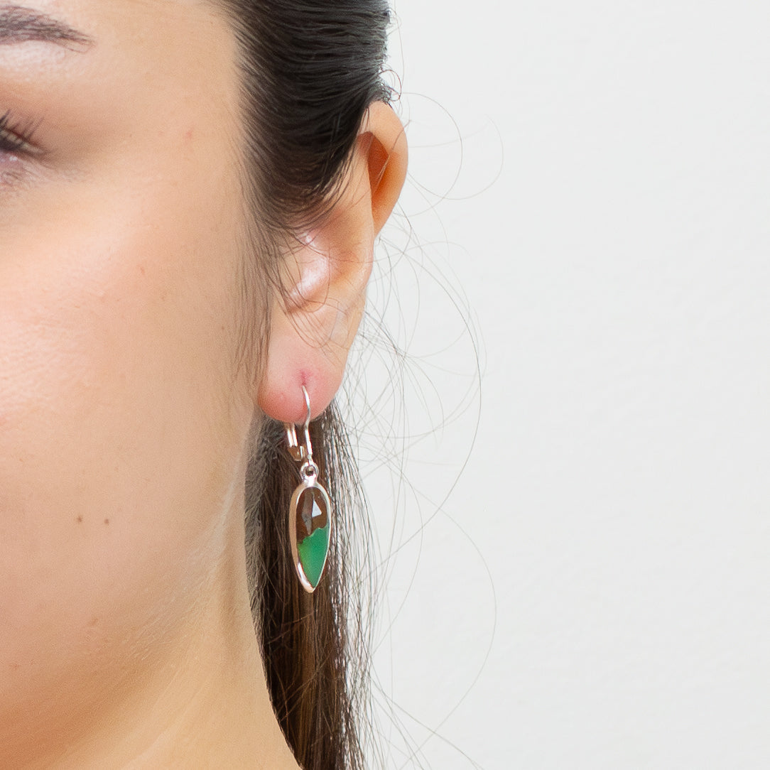 Faceted teardrop Chrysoprase in matrix earrings set in sterling silver with lever-back hooks ON MODEL. | MADE IN EARTH