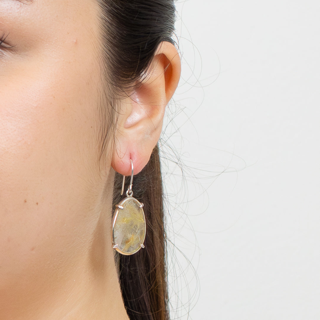 Golden Rutilated Quartz faceted oval drop earrings in sterling silver with visible golden rutile strands | MADE IN EARTH