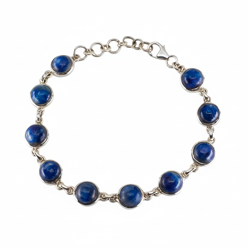 Kyanite cabochon bracelet with deep blue stones set in sterling silver