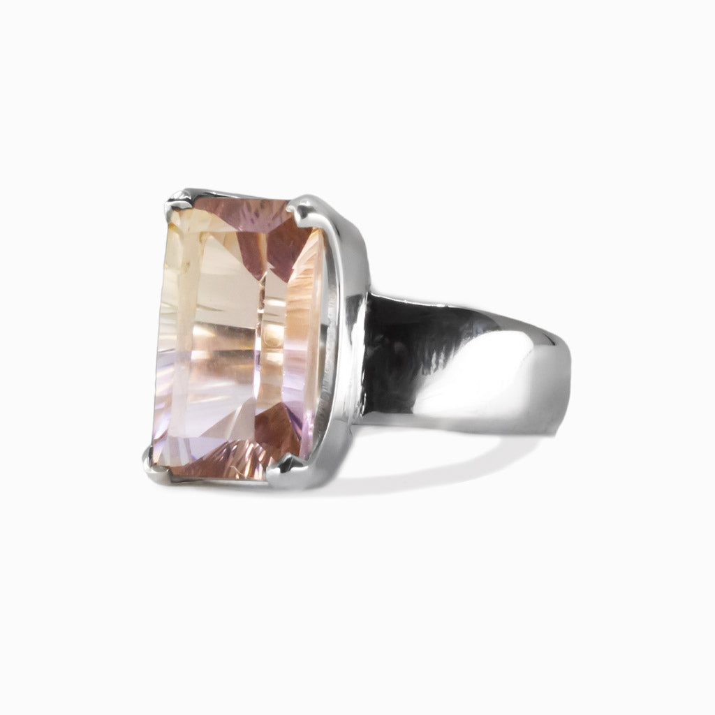 Ametrine faceted rectangle ring in sterling silver featuring violet and golden hues within one gemstone. | MADE IN EARTH