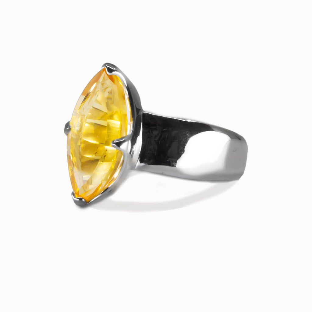 Citrine faceted marquise ring in sterling silver featuring golden-yellow gemstone with brilliant sunlit sparkle | MADE IN EARTH