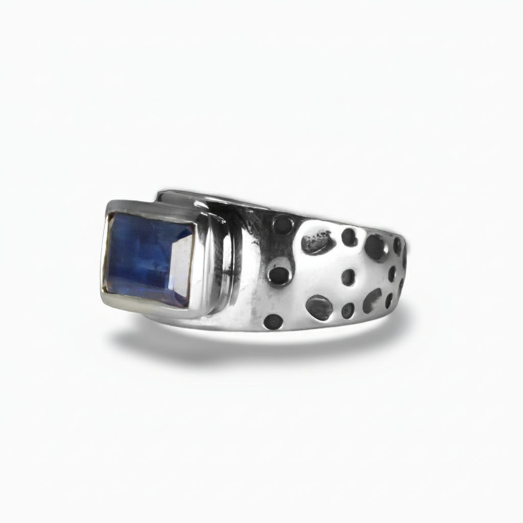 Faceted rectangle Kyanite ring with textured sterling silver band featuring layered blue and white gemstone. | MADE IN EARTH