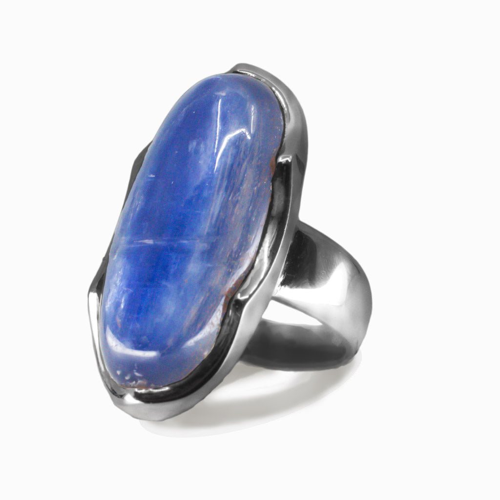 Large oval Kyanite cabochon ring in sterling silver with layered blue and white crystalline patterns.