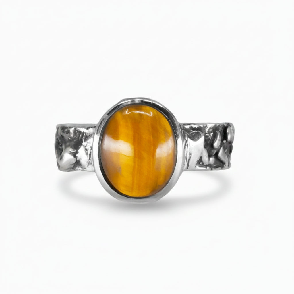 Oval Tiger Eye cabochon ring in textured sterling silver featuring golden-brown shimmering gemstone. |MADE IN EARTH