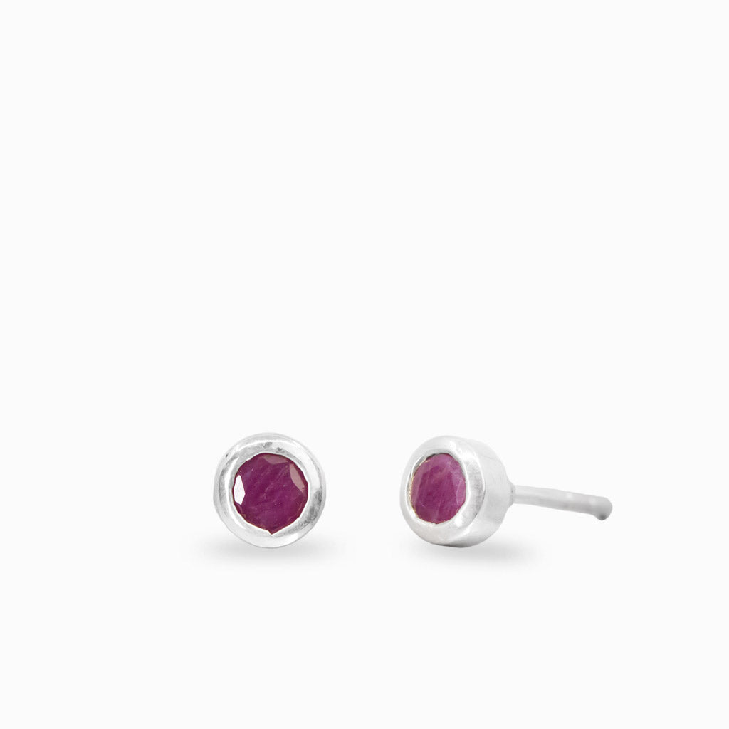 Faceted ruby stud earrings in sterling silver