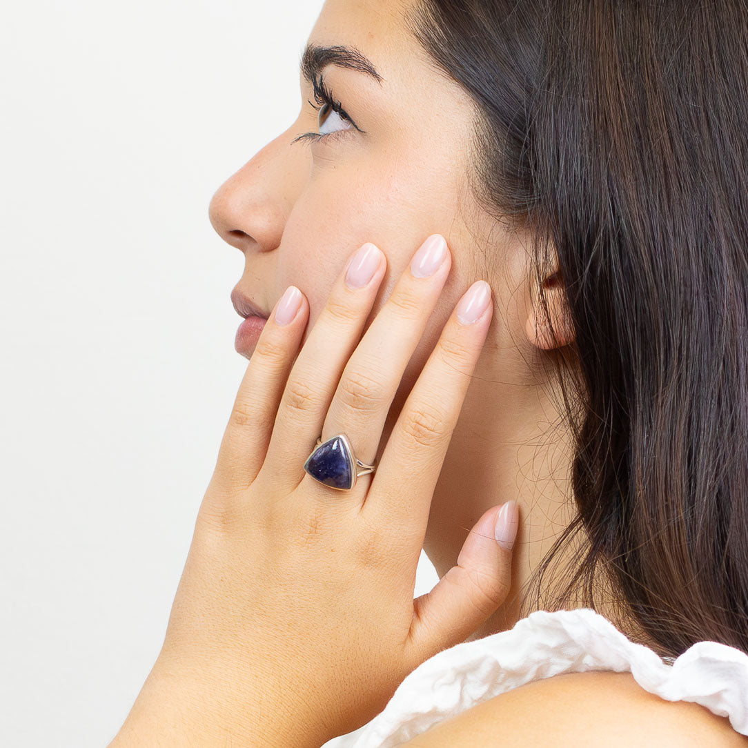 Triangle iolite cabochon ring set in sterling silver bezel with blue violet gemstone. MADE IN EARTH