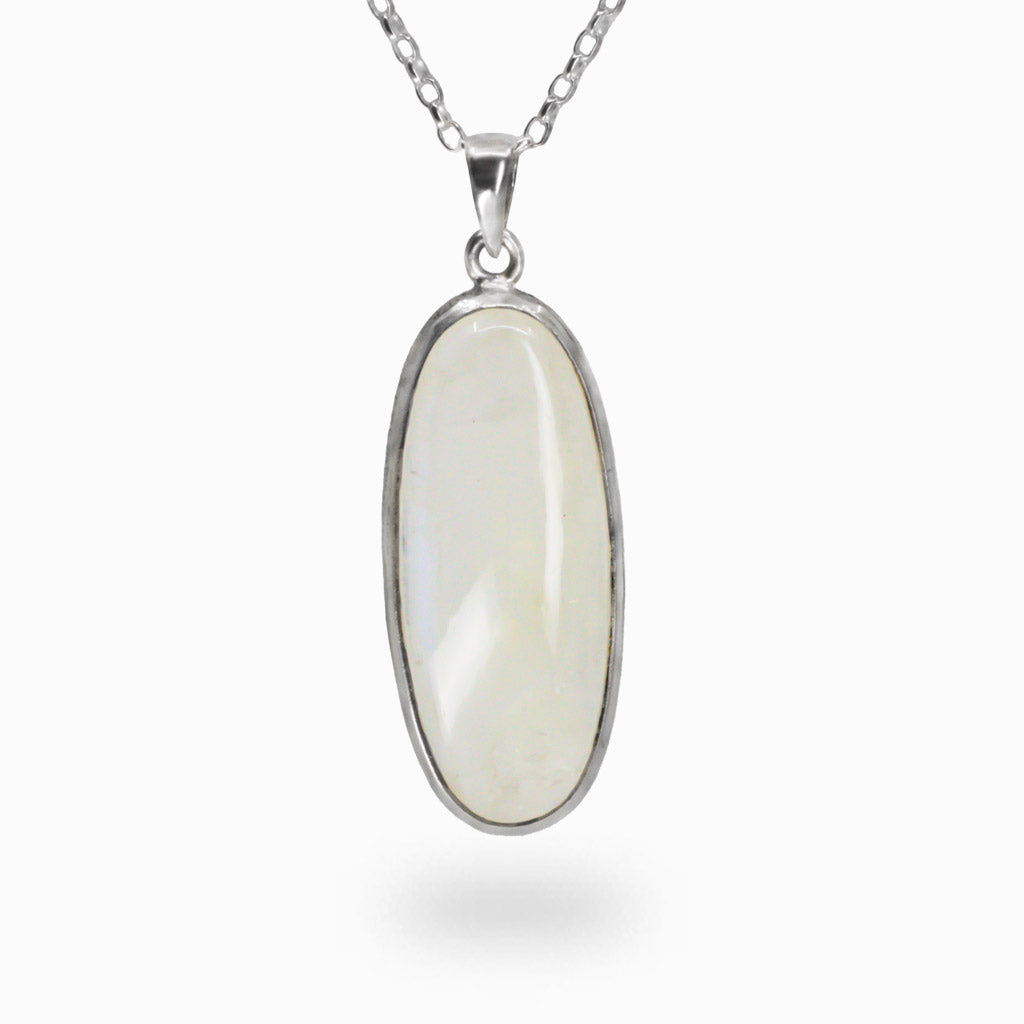 Oval Rainbow Moonstone necklace in sterling silver with glowing white surface and blue flash. | MADE IN EARTH
