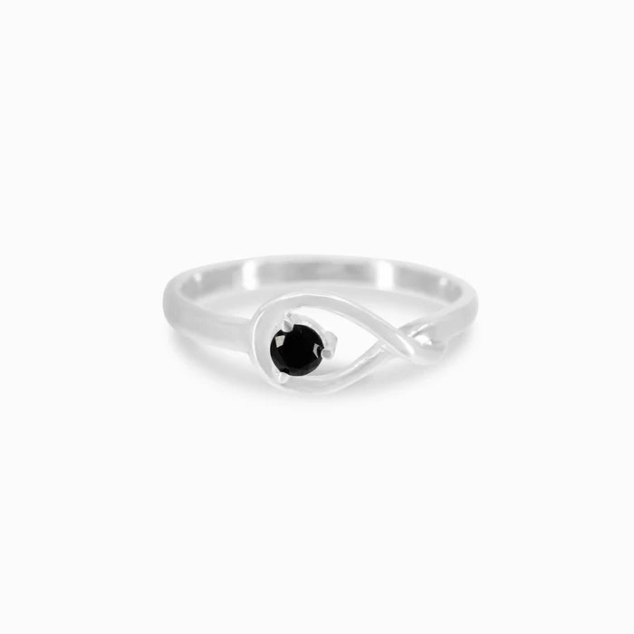 Round faceted Black Onyx gemstone prong set in polished sterling silver ring.