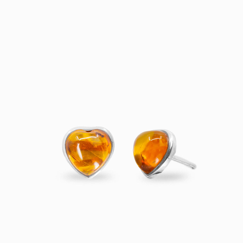 Heart amber stud earrings in sterling silver