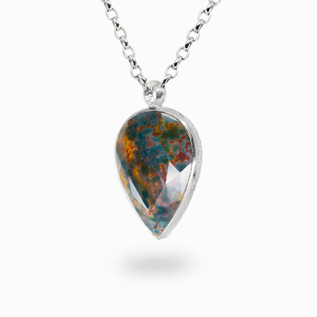 Faceted teardrop Bloodstone pendant necklace in sterling silver with natural green and red coloration.
