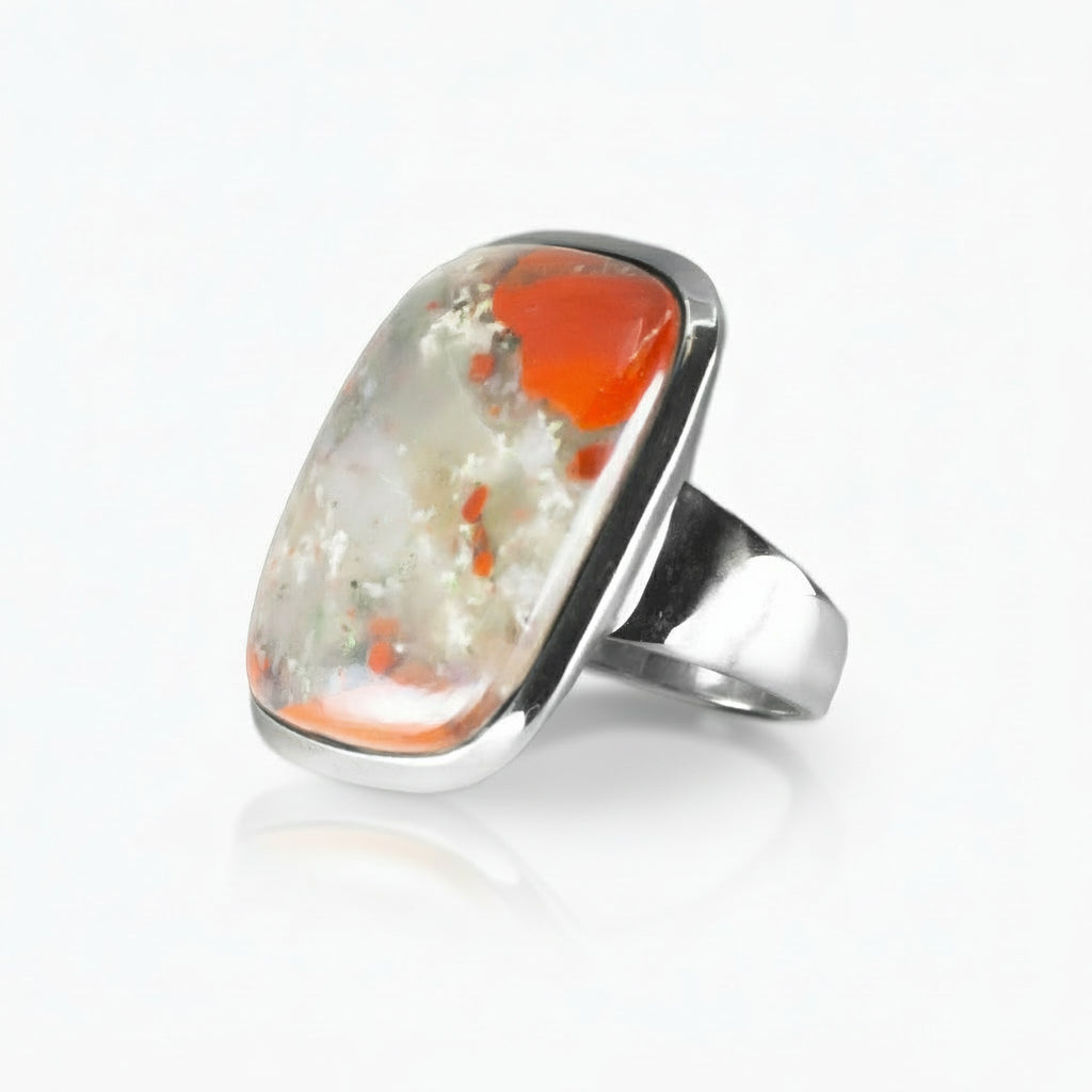 Rectangular Volcano Jasper ring with fiery red and earthy mineral patterns set in polished sterling silver on a white background. | MADE IN EARTH