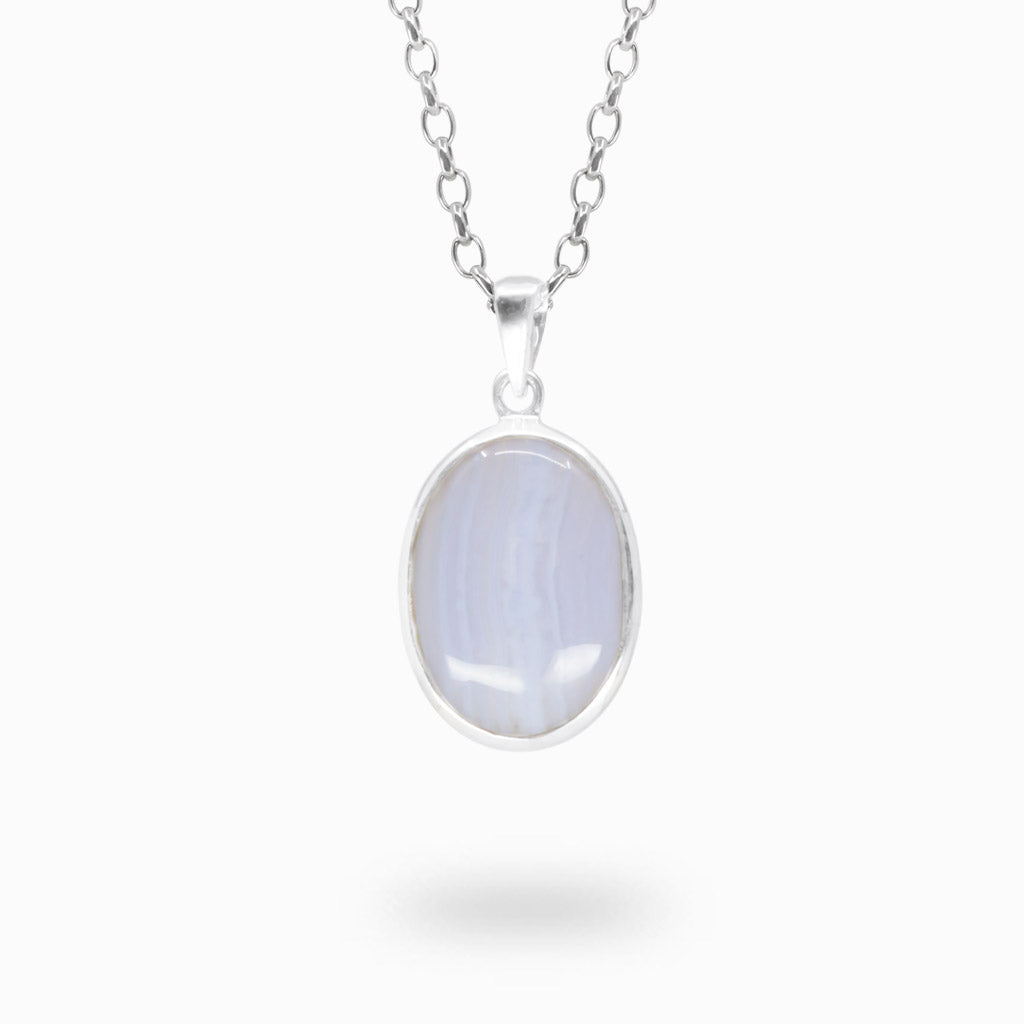 Oval pale blue Blue Lace Agate cabochon pendant with subtle natural banding in polished 925 sterling silver.