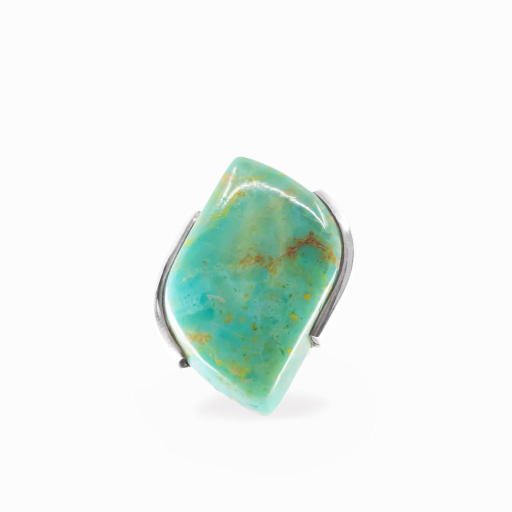Campo Frio Turquoise freeform cabochon ring in polished sterling silver with aqua blue coloring and natural golden-brown matrix.