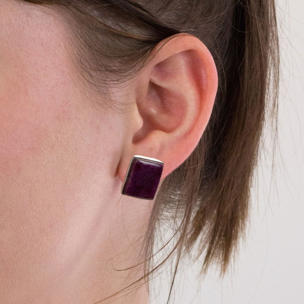 Ruby stud earrings on model