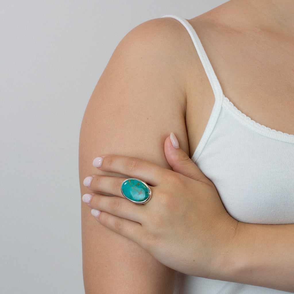 Cabochon Oval Kingman Turquoise ring on model