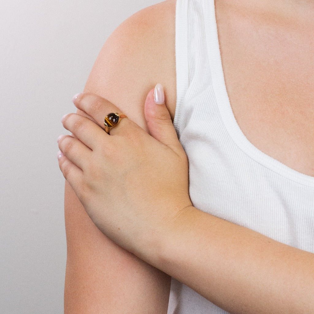 Cabochon Tiger eye ring on model