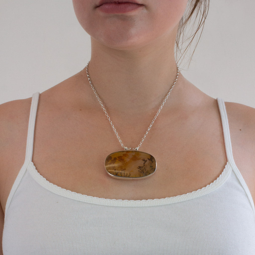 Cabochon Oval Dendritic Quartz necklace on model