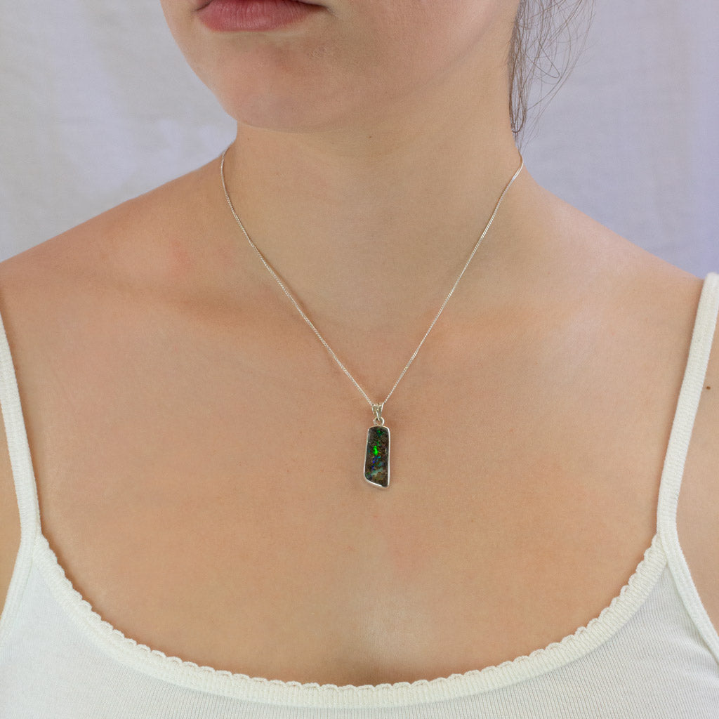 Boulder Opal necklace on Model