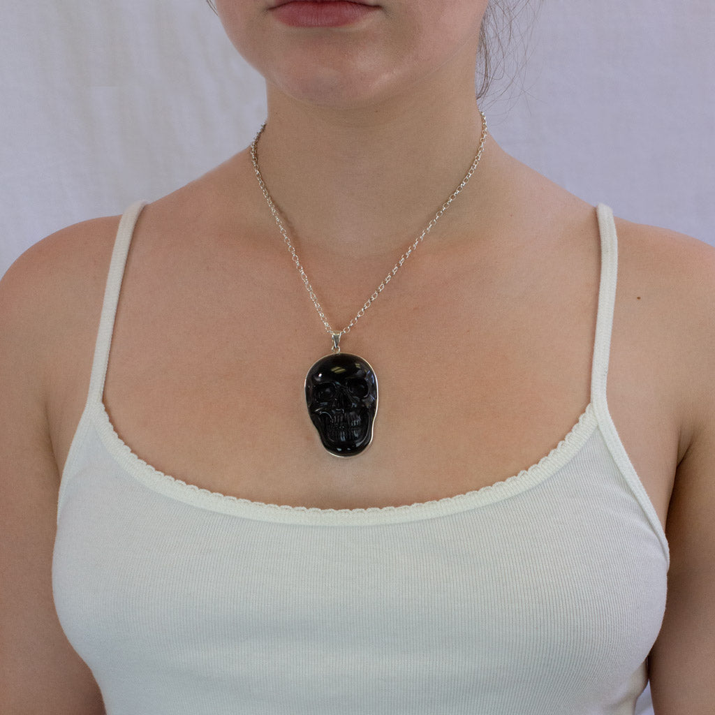 Black Obsidian Skull necklace on model