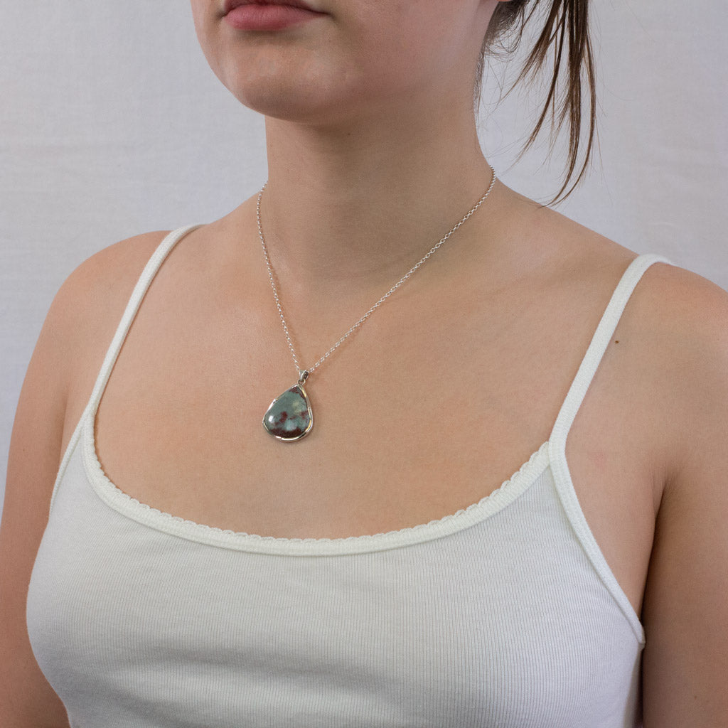 Teardrop Cabochon Light blue with red accents Bloodstone Necklace on model