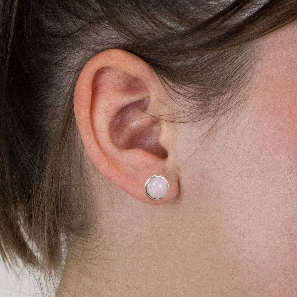 Kunzite stud earrings on model