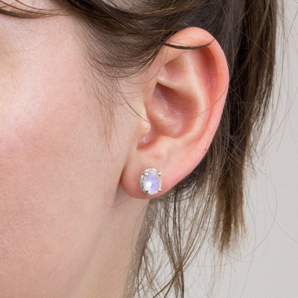 RAINBOW MOONSTONE STUD EARRINGS ON MODEL