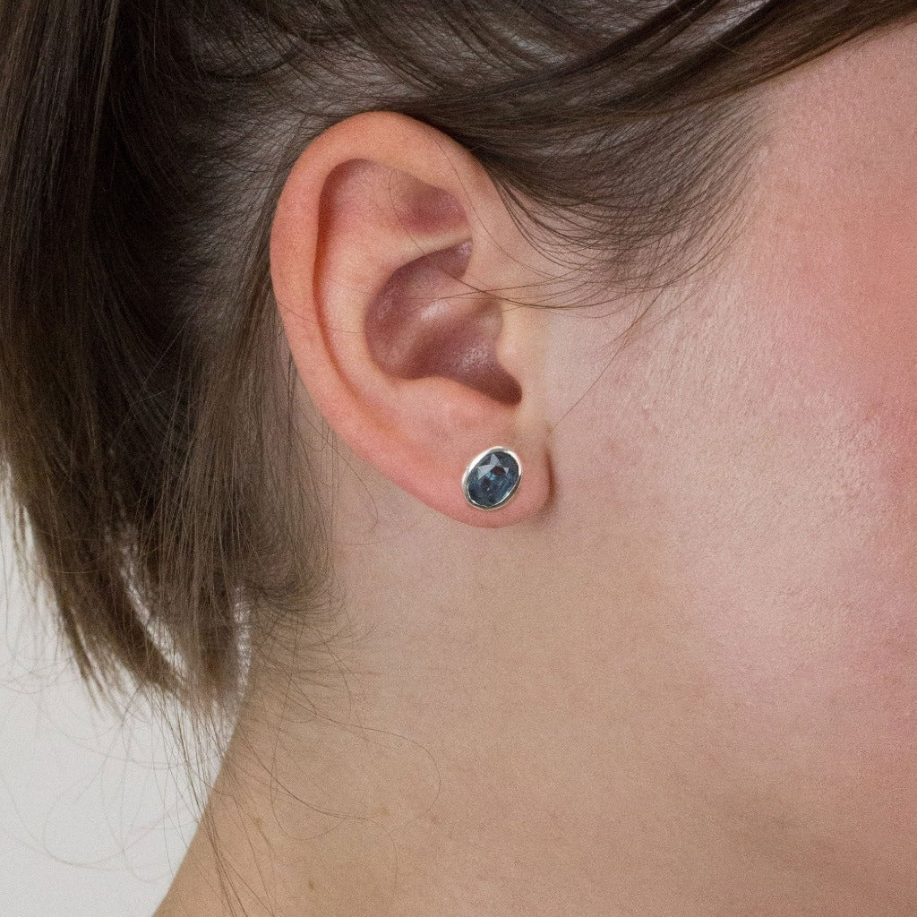Kyanite stud earrings on model