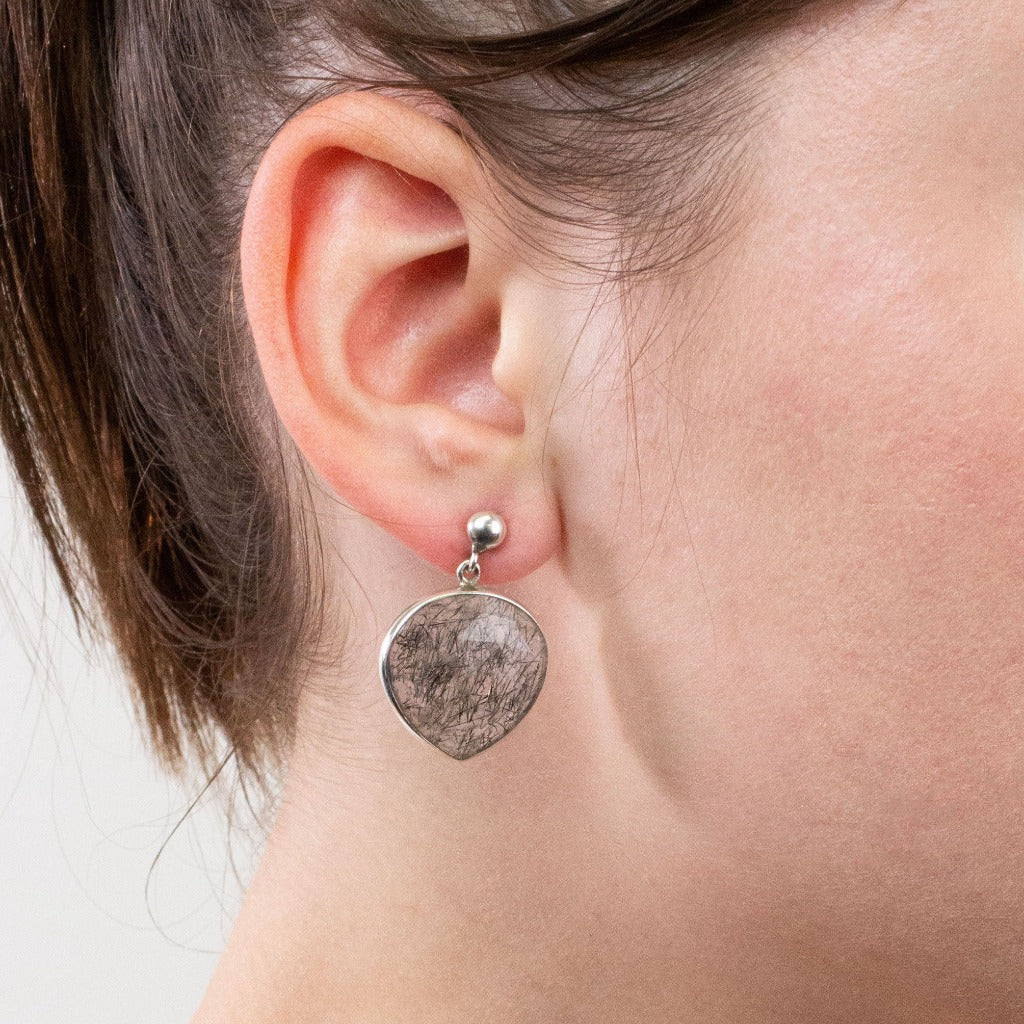 Tourmalinated Quartz stud drop earrings on model